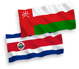 Flags of Sultanate of Oman and Republic of Costa Rica on a white background