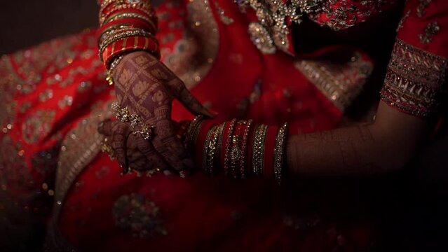 Traditional Indian Bridal Dress, Indian Wedding Background, Bridal Getting Ready for Wedding Ceremony, Bangles and Mehndi Hands close up