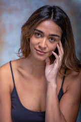 Young woman in a studio photo session