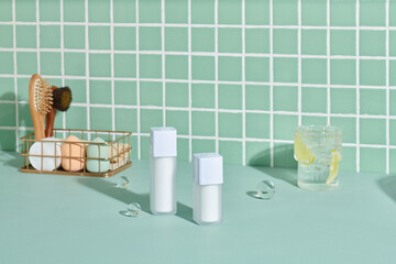 Unbranded serum bottle and anti-cellulite brush for dry body massage