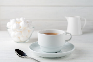Coffee with cream and airy egg white cake