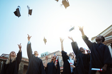 Diversity, graduation hat or students with celebration, university or happiness outdoor. Young people, men or women with degree completion, education or knowledge for success, graduate or achievement