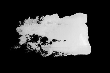 Fototapeta premium Abstract cream stroke of white paint. Raw thick white color dye imprint. Isolated on black background.