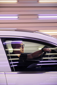 Asian man and new electric energy car