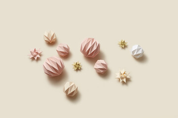 Pink paper cut Christmas and New Year ornaments.