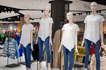 Female mannequins in women fashion store, Sale of clothes