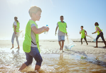 Plastic recycling, children and beach cleaning for eco friendly sustainability, teamwork and global...