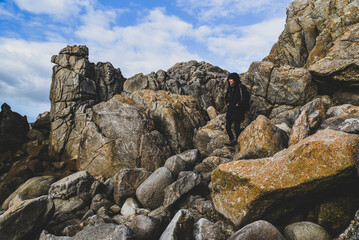 Beautiful and wild rocky coast of France in vintage retro tones, vintage landscape of coastline of France..