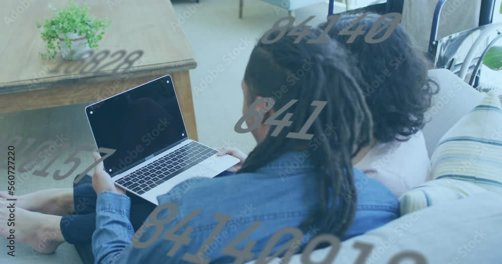 Aufkleber animation of data processing over diverse couple using laptop