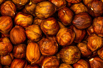 Hazelnut Background. Heap of peeled hazelnuts.