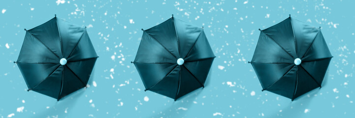 Open umbrella for shelter from the rain. Spring and autumn weather. Protection and shelter from bad weather and snow. Banner