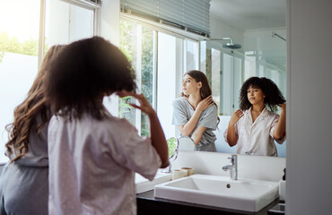 Women, bonding or grooming in home bathroom for morning routine, house healthcare wellness or relax...