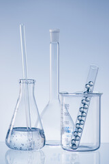 Laboratory research concept. Scientific laboratory glassware with liquid.