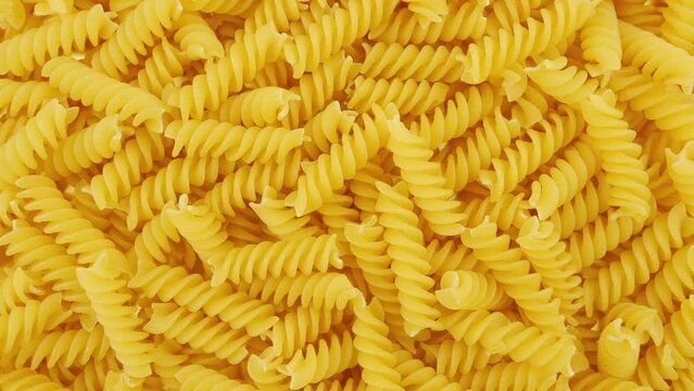 Pasta Fusilli or Rotini. Traditional Italian cuisine, durum wheat pasta, view from above