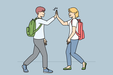 Smiling schoolchildren walking outdoors give high five. Happy friends greeting using non-verbal communication. Vector illustration. 