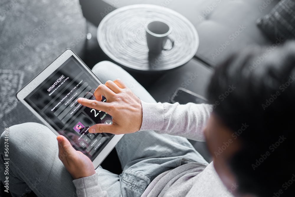 Leinwandbilder Tablet, sofa or man with smart home system for air conditioning, safety security network or house automation. AI software app, digital dashboard or top view of person programming interactive IOT tech