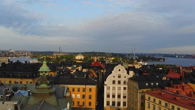 Drone footage. Rising over the roofs of Gamla Stan in Stockholm.