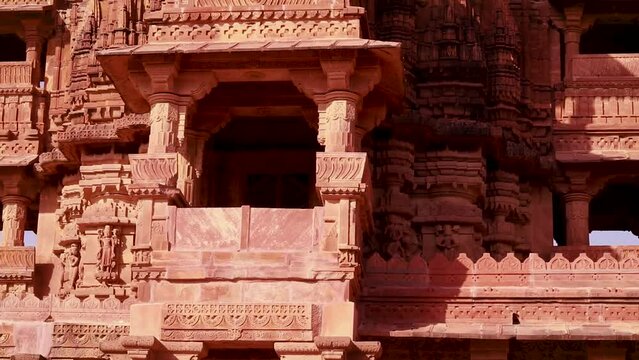 ancient hindu temple architecture with bright sky from unique angle at day shot taken at mandore garden jodhpur rajasthan india.