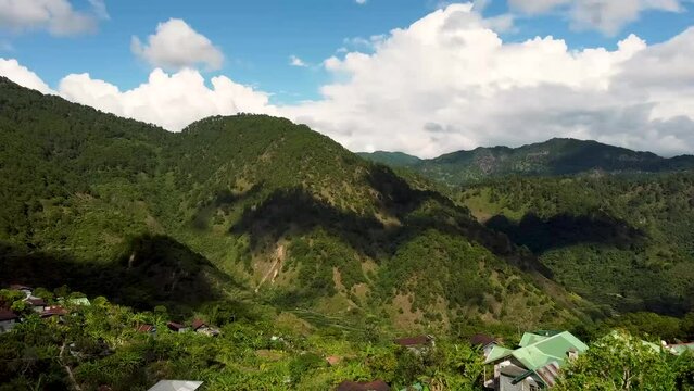 Aerial footage of mountains and clouds in Tetepan, Sagada, Mountain Province, Philippines using DJI Mini 2. Peaceful and simple rural living in the countryside of the Philippines.