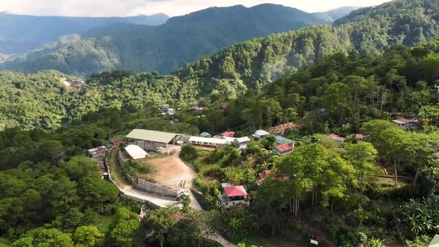 Aerial footage of local village school, Tetepan Elementary School, Sagada, Mountain Province, Philippines using DJI Mini 2. Peaceful and simple rural living in the countryside of the Philippines.