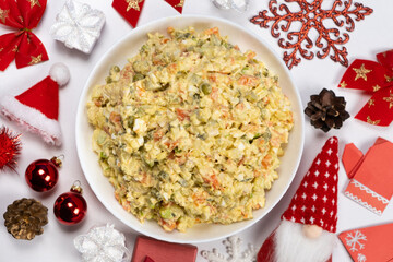 Olivier Russian salad on a Christmas and New Year background, top view.