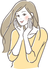 頬に手を当て微笑む女性