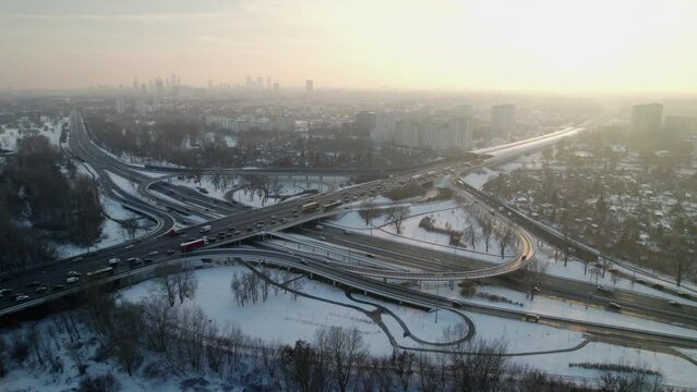 Panoramic aerial view of the intersection S8, with traffic at  rush hour with icy road covered of snow in the city of Warsaw, Poland.