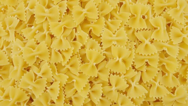 Pasta Farfalle or Bow-Tie pasta. Traditional Italian cuisine. Finest durum wheat pasta, view from above