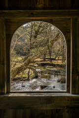 window of covered bridge looking out