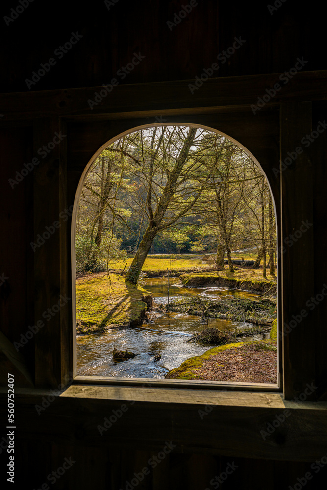 Poster window of covered bridge looking out