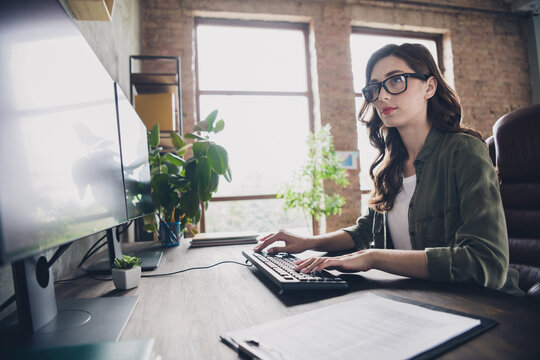 Profile photo of talented clever web designer lady sitting chair keyboard write operating network open space indoors