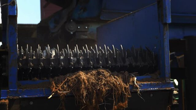 A machine for cleaning peat from stones. Fertilizer production
