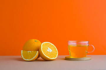 A front view of orange decorated with tea