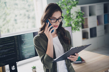 Photo of beautiful freelancer communicating apple samsung device checking tasks list indoors...