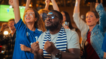 Soccer Club Members Cheering for Their Team, Playing in an International Cup Final. Supportive Fans...