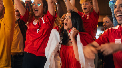 Close Up Portraits of a Diverse Group of Supportive Soccer Fans with Painted Faces Standing in a...
