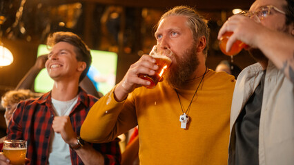 Group of Good Friends Enjoying Their Time in a Sports Pub. Three Men Cheering for Their Favorite Soccer Team. Young People Celebrating and Toasting Beer Glasses When Players Score a Goal and Win.