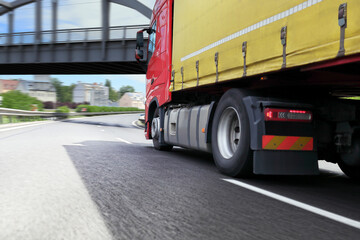 Naklejka premium A fast truck running on the highway 