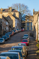 Quiet street in Richmond, North Yorkshire, with residential houses and no people © ImageryBT
