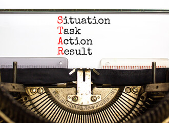 STAR situation task action result symbol. Concept words STAR situation task action result on typewriter on beautiful white background. Business STAR situation task action result concept. Copy space
