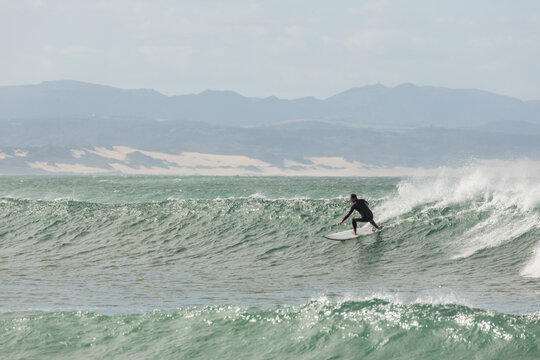 A Male Surfer On A Big Wave At Jeffery's Bay, South Africa