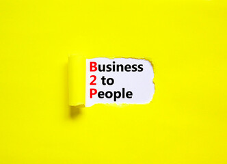 B2P business to people symbol. Concept words B2P business to people on white white paper on a beautiful yellow background. Business and B2P business to people concept. Copy space.