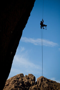 A climber jugging a fixed line on Piedra Parada, Argentina.