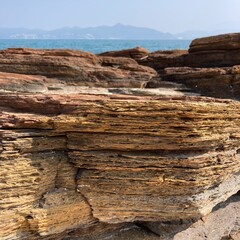 yellowish sedimentary rocks in tung ping chau, hong kong - in square