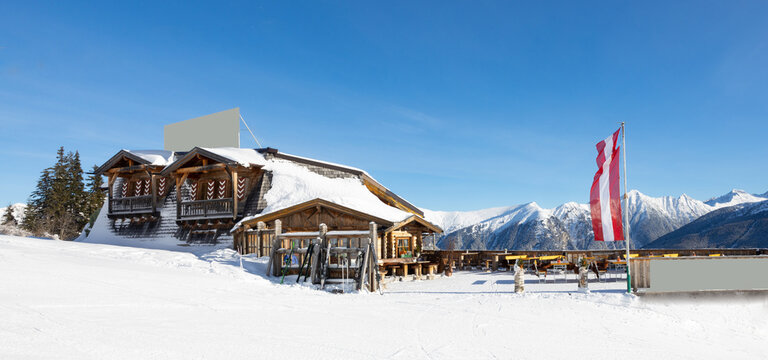 Sunny view of a ski hut in the Alps, Austria, Salzburg