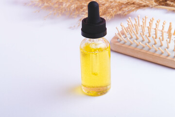 Oil for hair growth. Therapeutic oil to activate hair growth. Beauty and health.