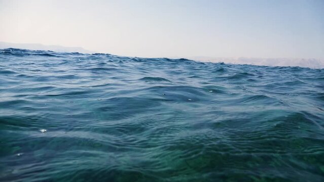 Adriatic Sea waves very close to the camera and going underwater
