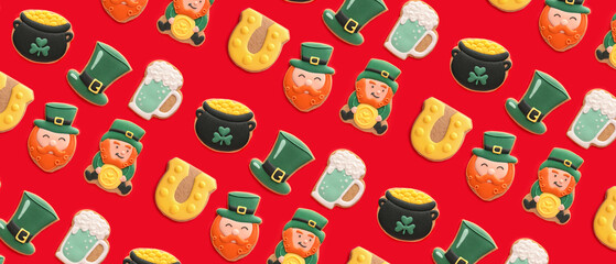Many cookies for St. Patrick's Day on red background