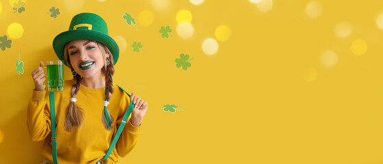 Obraz na płótnie Canvas Happy young woman with big head and glass of beer on yellow background with space for text. St. Patrick's Day celebration