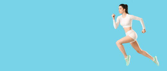 Sporty running woman on light blue background with space for text